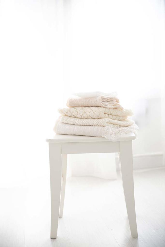 white fabrics used during newborn photography session