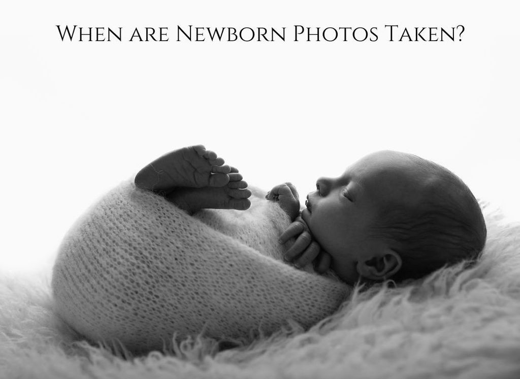 portrait of sleeping newborn  swaddled in a soft white wrap. The photo was taken during a newborn photoshoot with Valentina in London