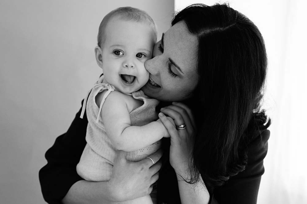 mum and baby hugging during mother's day photoshoot